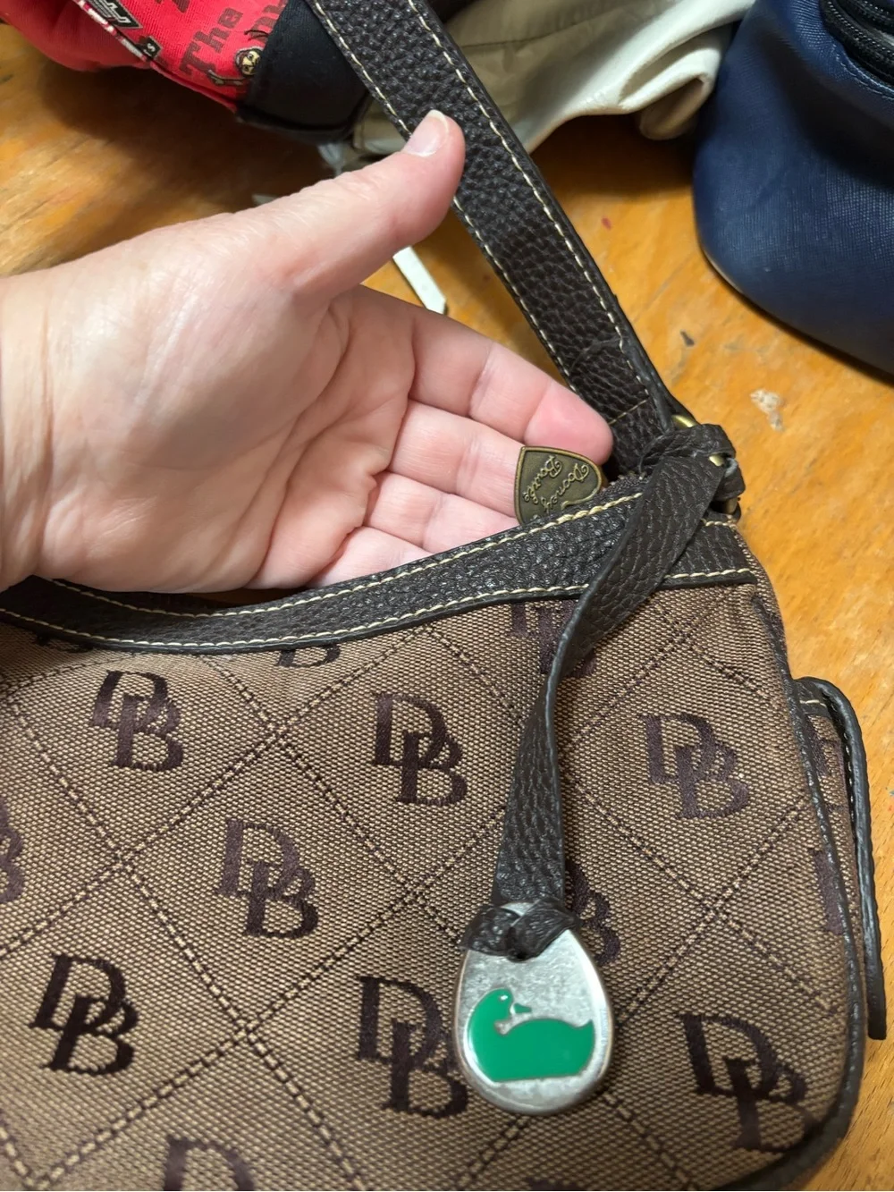 Dooney & Bourke Brown Monogram Shoulder Bag with Green Charm